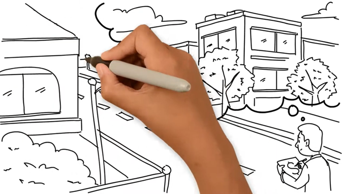 A still image from the video shows a hand holding a black drawing a scene showing a developer imagining what their project might look like on a particular city street