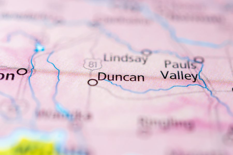 A map image shows the location of the small town of Duncan within Oklahoma