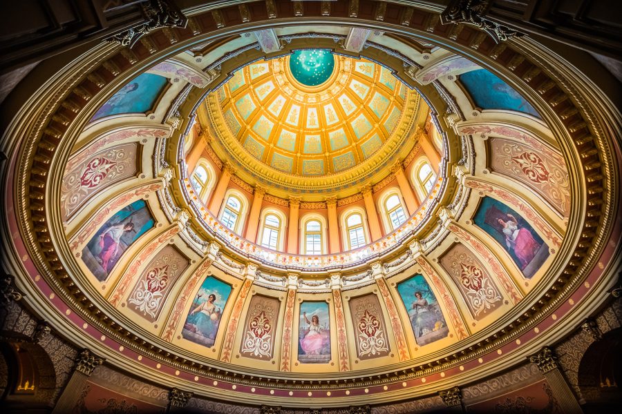 The colorful interior of the Michigan State Capitol dome features eight 