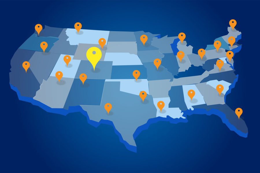 A map of the United States with one yellow pin in Colorado showing a primary city location and a bunch of smaller orange pins showing its peer cities