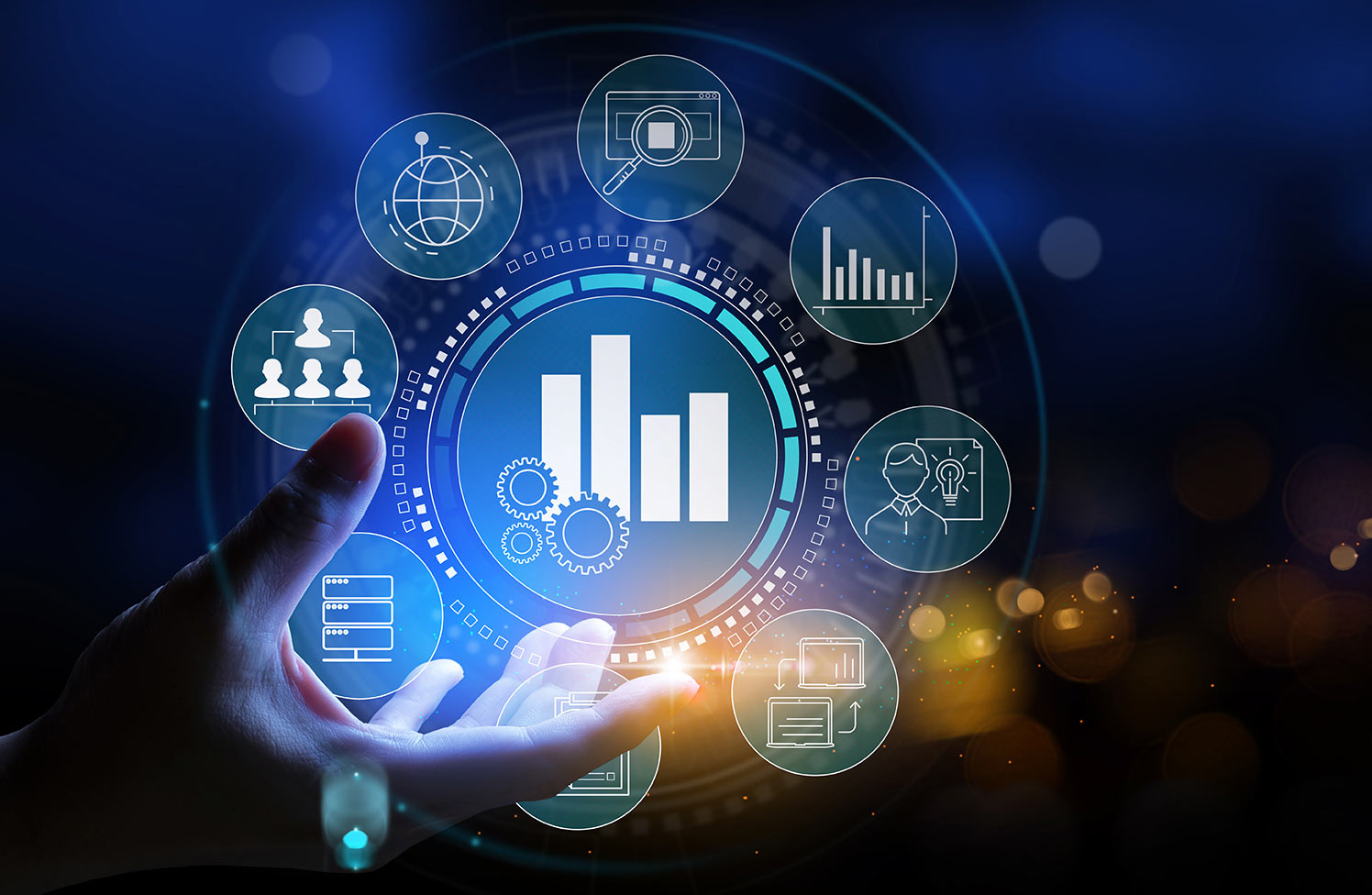 A human hand holds up a variety of icons representing data analysis, business contacts, organizational charts, checklists, ideation, file searches, databases, and servers