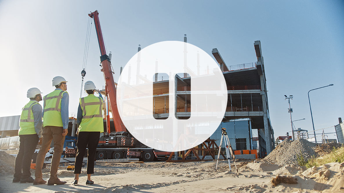 An image of an active real estate development site with a "pause" button over it illustrates the concept of a market that isn't ready for new development
